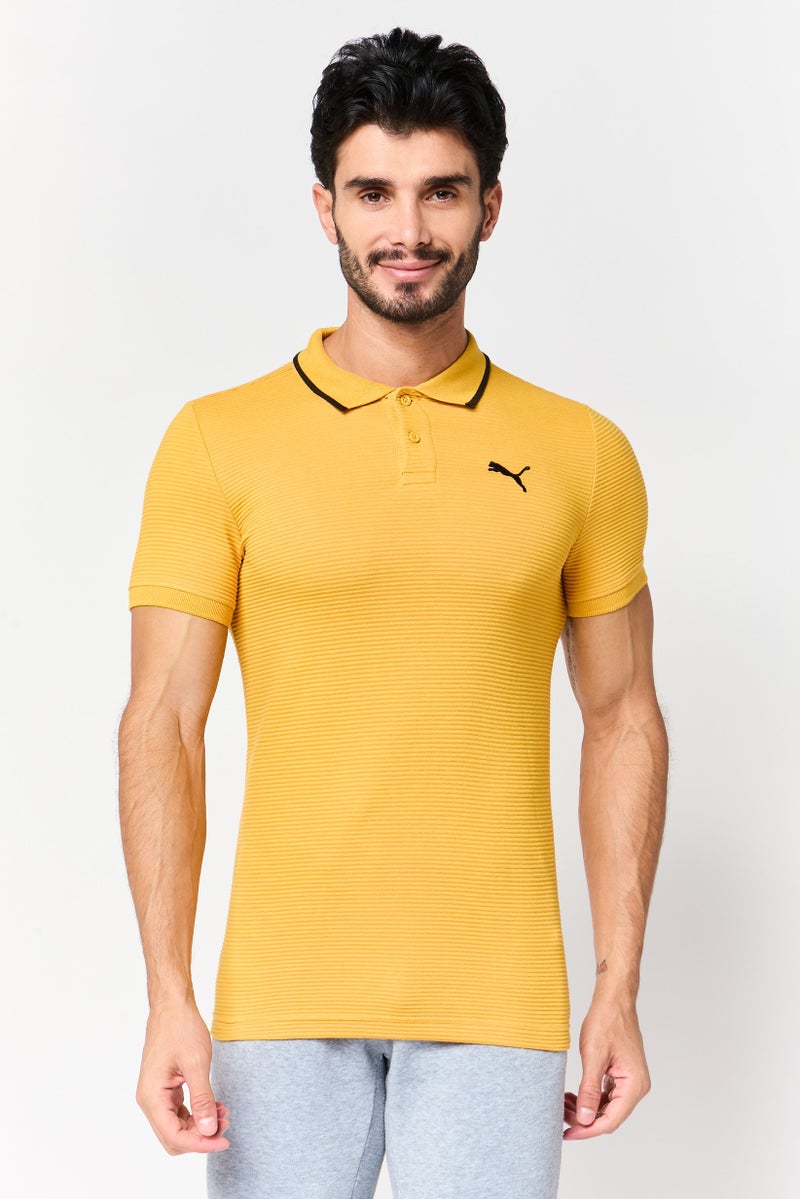 PUMA قميص بولو قصير الأكمام للرجال، رياضي، بتصميم أوتومان، لون خردل - Image 1
